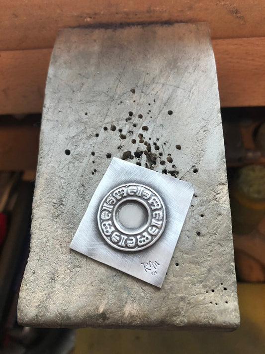 Pressed Metal Ring of Symbols Impression for Jewelry Making